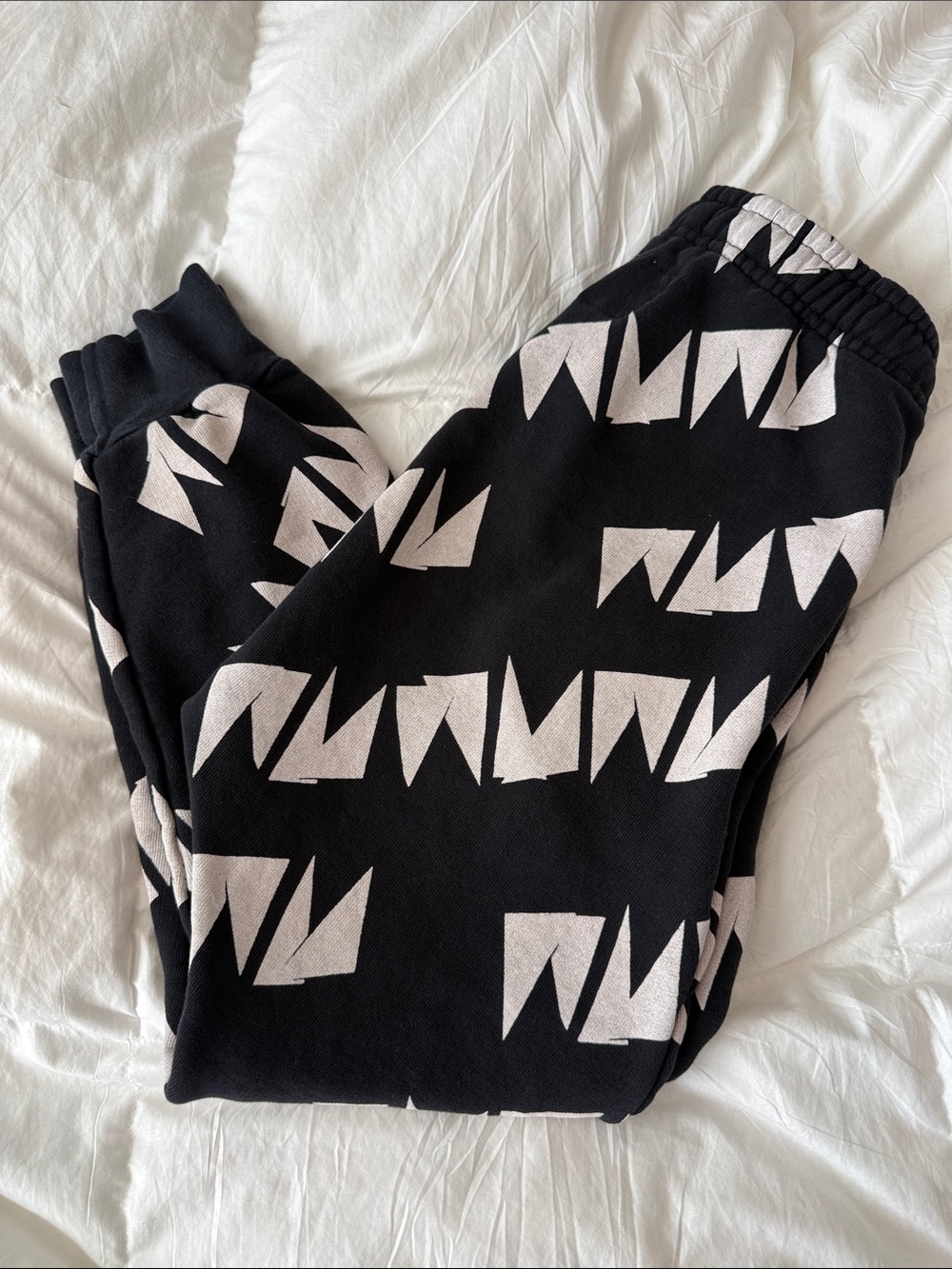 nununu Black Sweatpants with White Geometric Print